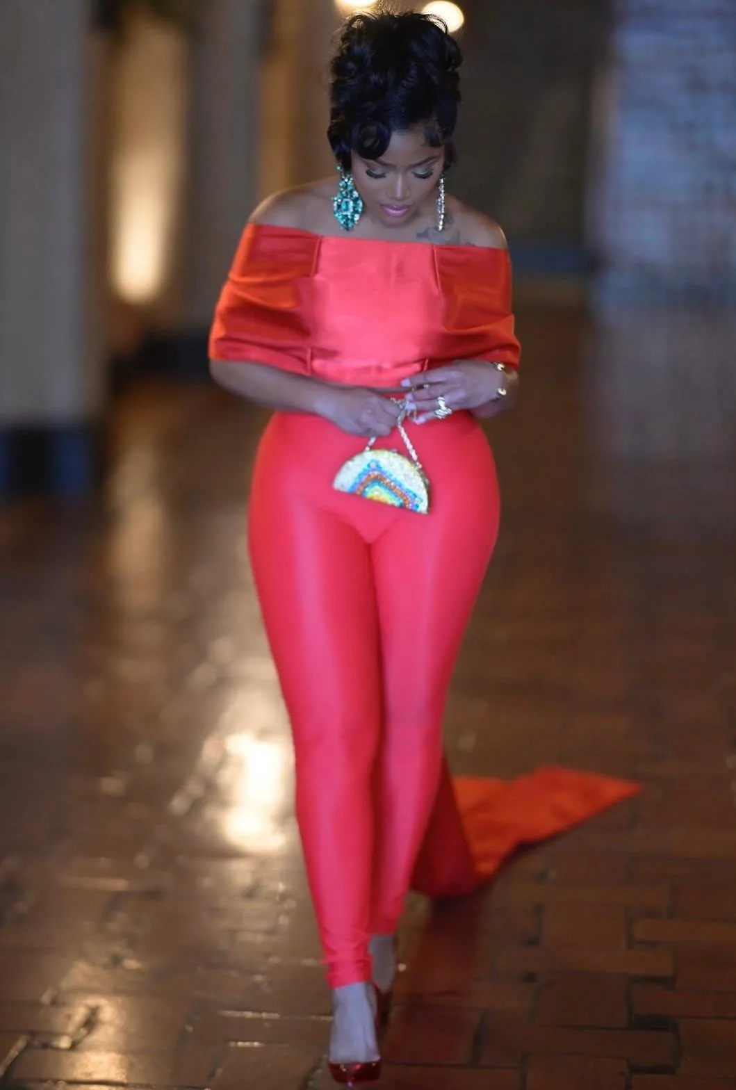 Actress Erica Pinkett in a red AltheaMink look, photo 7 of 7
